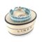Oval box with Links of London Logo branding and vintage friendship bracelet