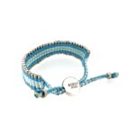 Side profile of aqua and light blue woven cord friendship bracelet