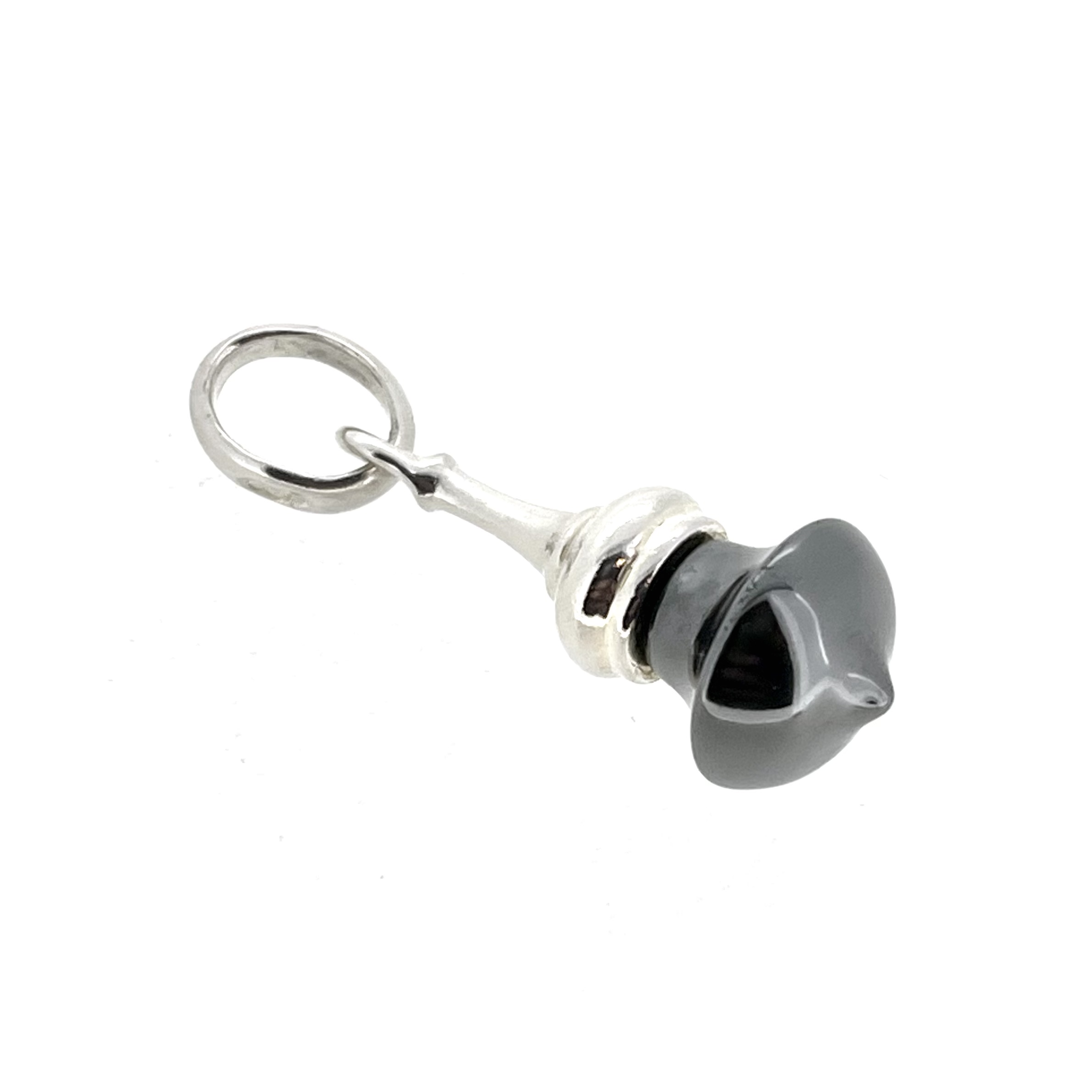 Side view of hematite dome charm with silver bail