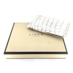 Links of London crocodile-embossed silver business card holder.