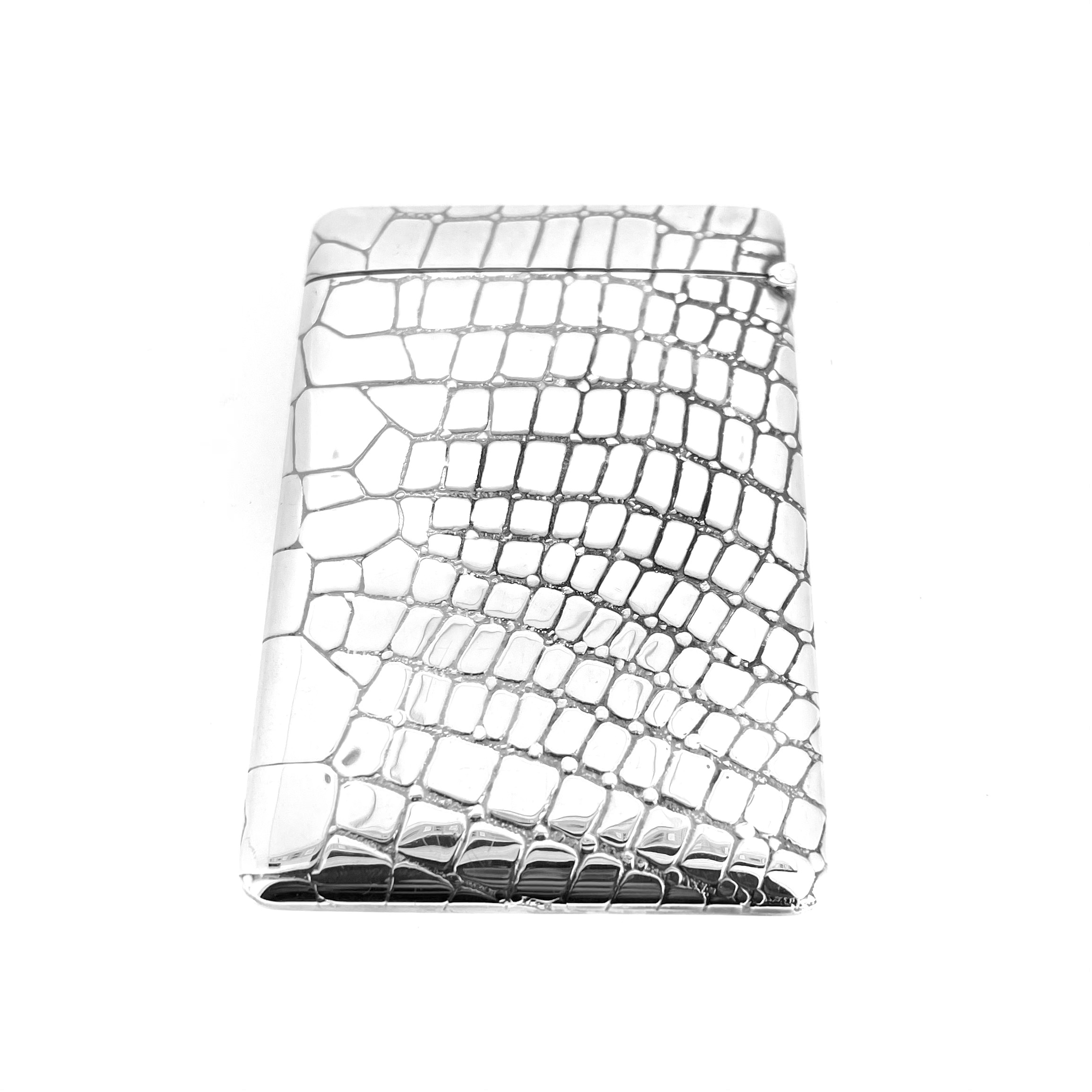 Close-up of crocodile textured silver card case hinge by Links of London.