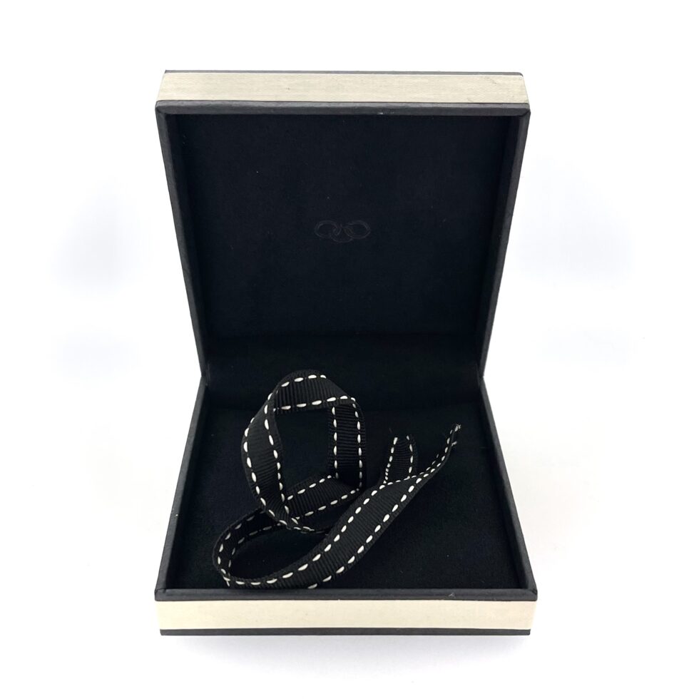 Empty Links of London jewellery box interior view.