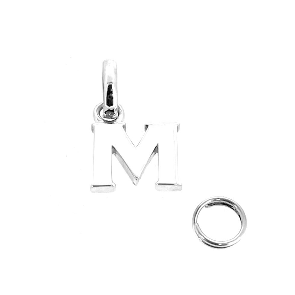 Restored Links of London M charm polished in sterling silver.