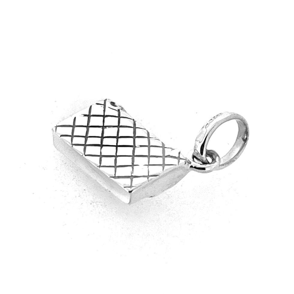 Diamond quilted pattern detail on vintage Links of London charm