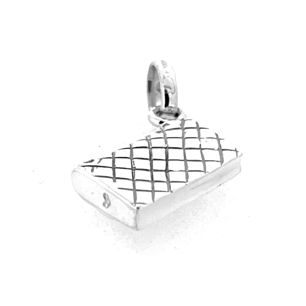 Side profile of vintage Links of London quilted charm