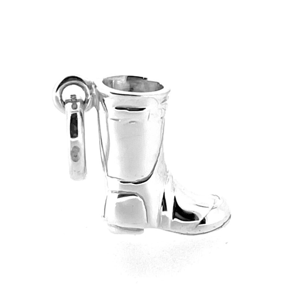 Silver Links of London boot charm on clean white surface.