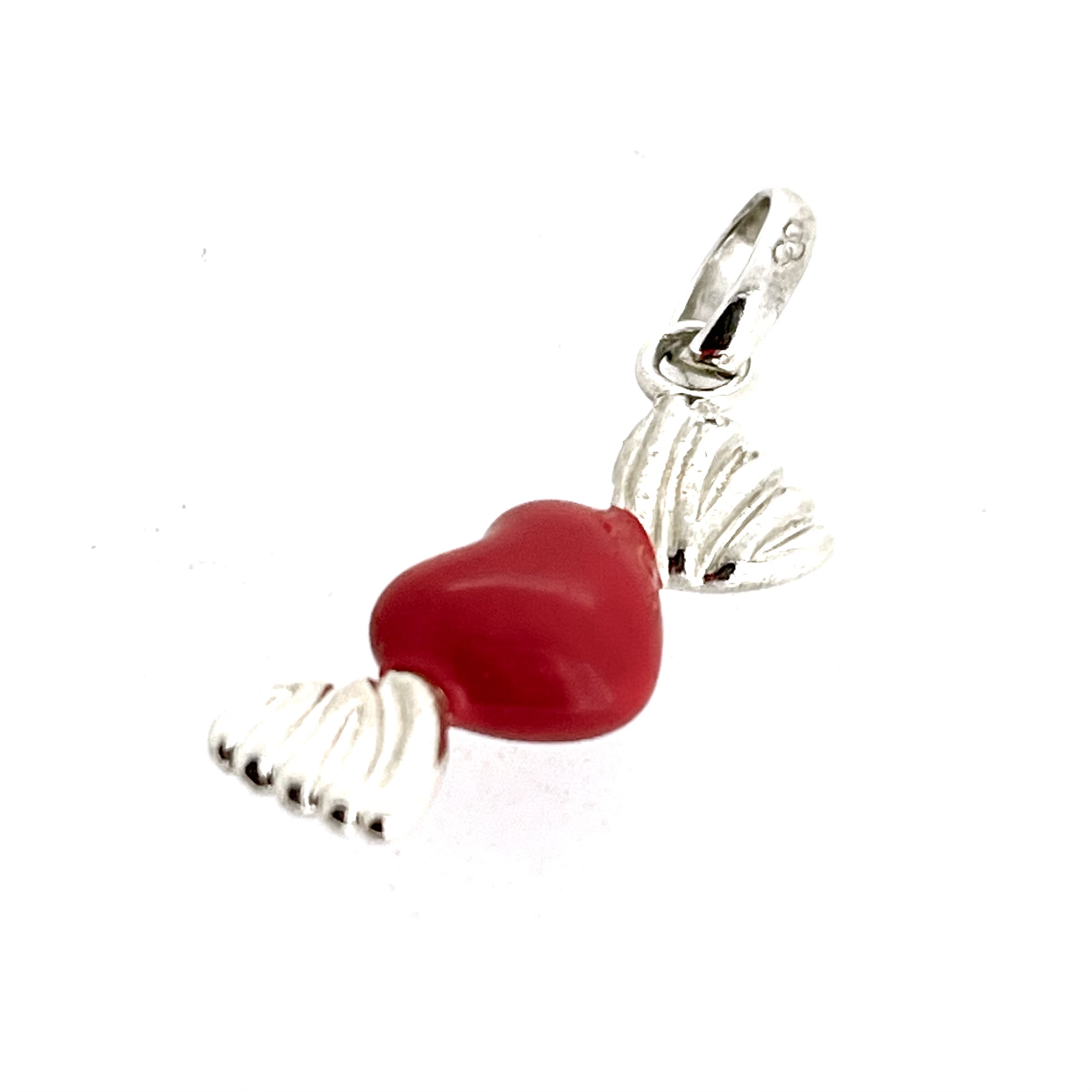 Side profile of the Sweetheart Charm showing enamel and silver details.