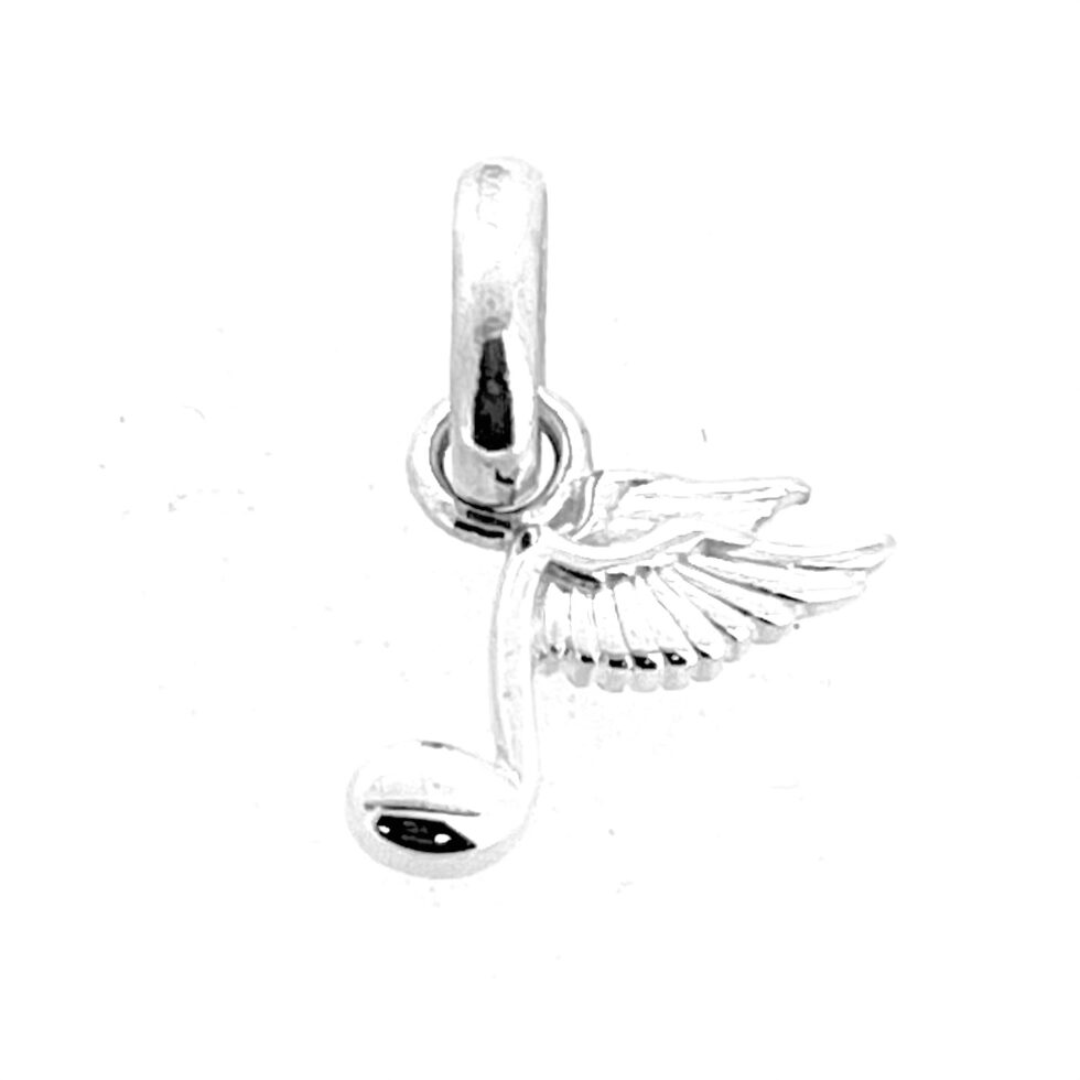 Wing and note charm photographed on white background.