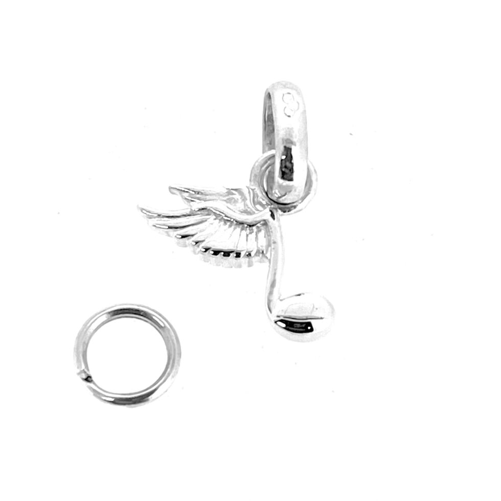 Detailed close-up of Links of London musical note charm.