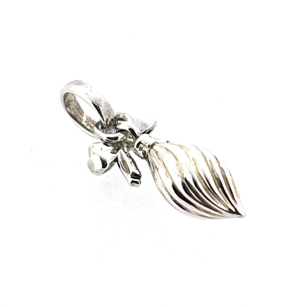 Side angle of vintage silver bauble charm.