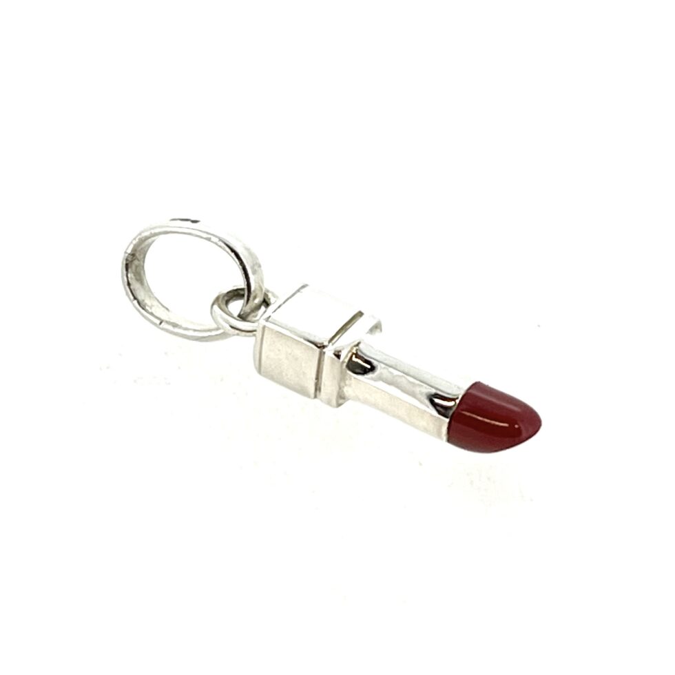 Polished silver lipstick charm viewed from above