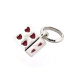 Close-up of enamelled heart side on cube charm