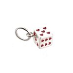 Front view of vintage Links dice charm
