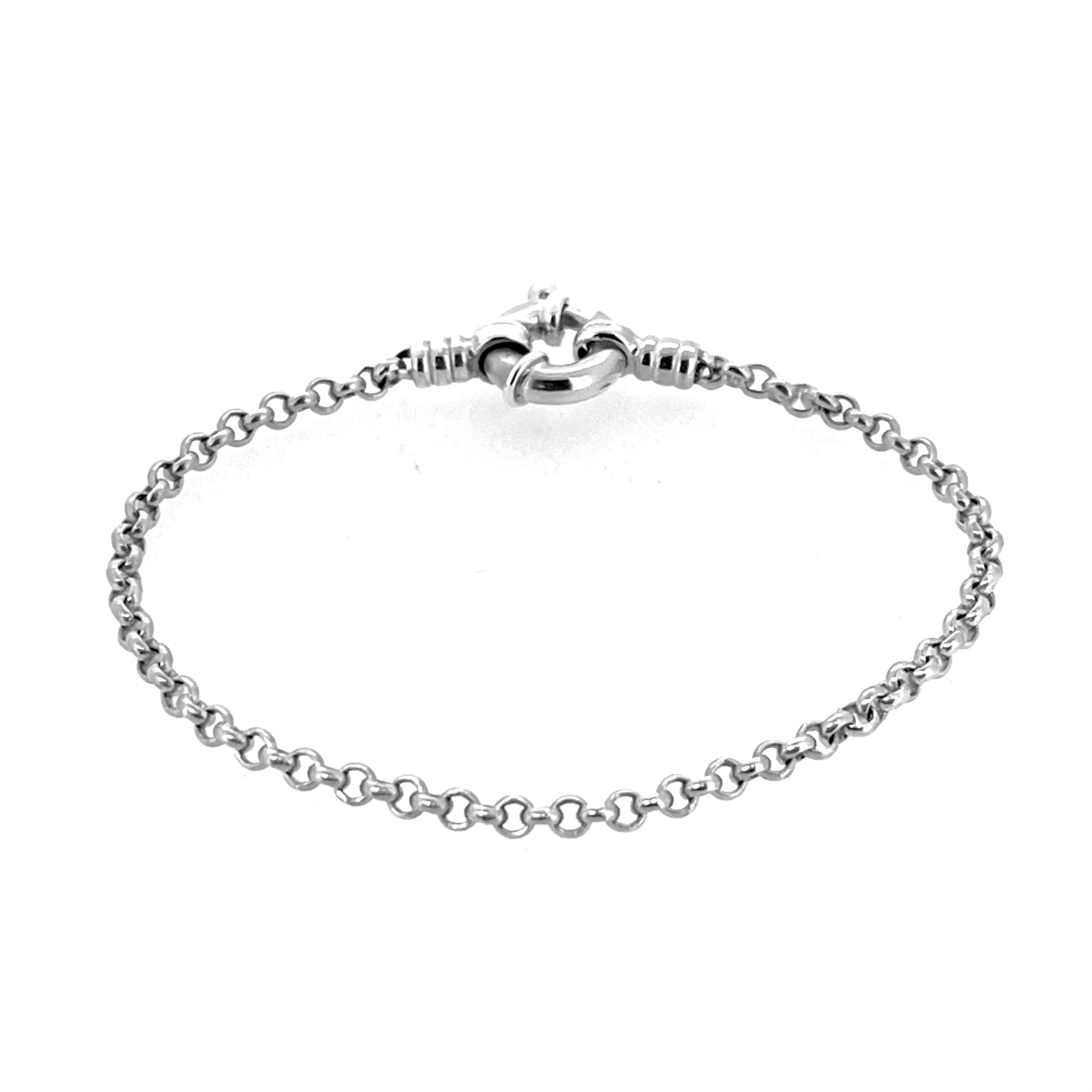Bracelet coiled on white background to highlight shine and proportion