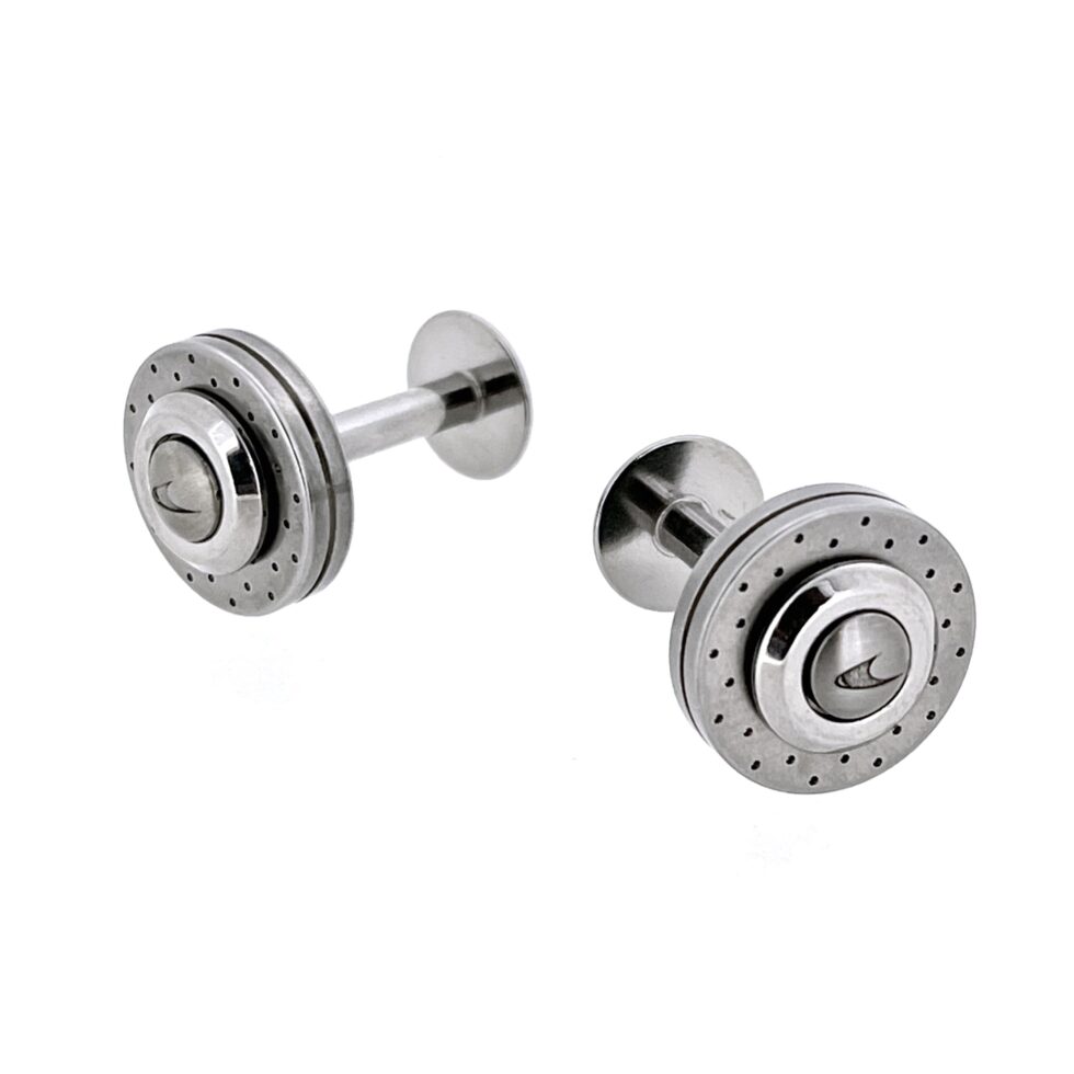 Stainless-steel and carbon-fibre double-ended cufflinks on white background