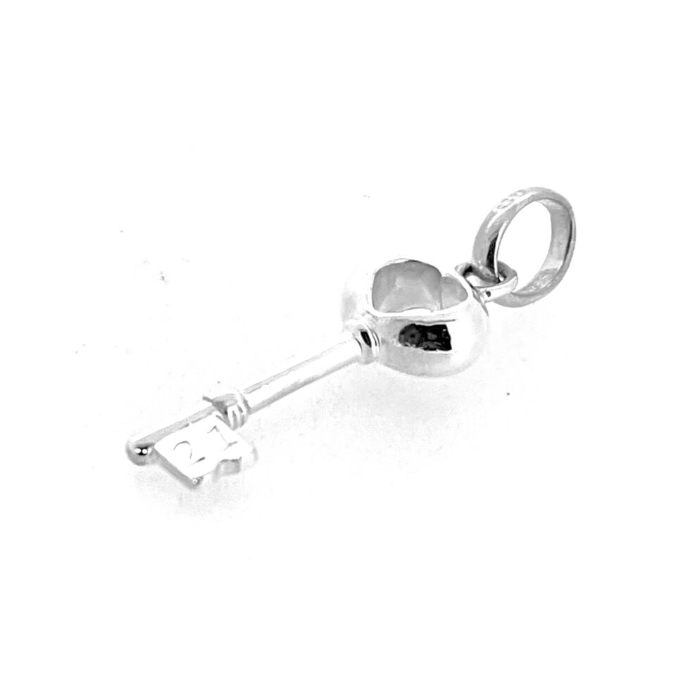 Links of London key charm featuring heart-shaped bow