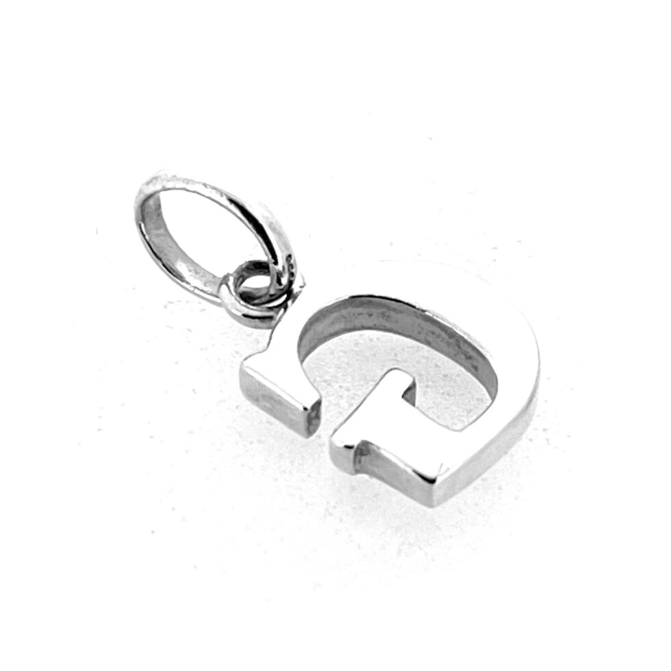 Polished vintage Letter G Charm close-up highlighting hallmark details and silver texture.