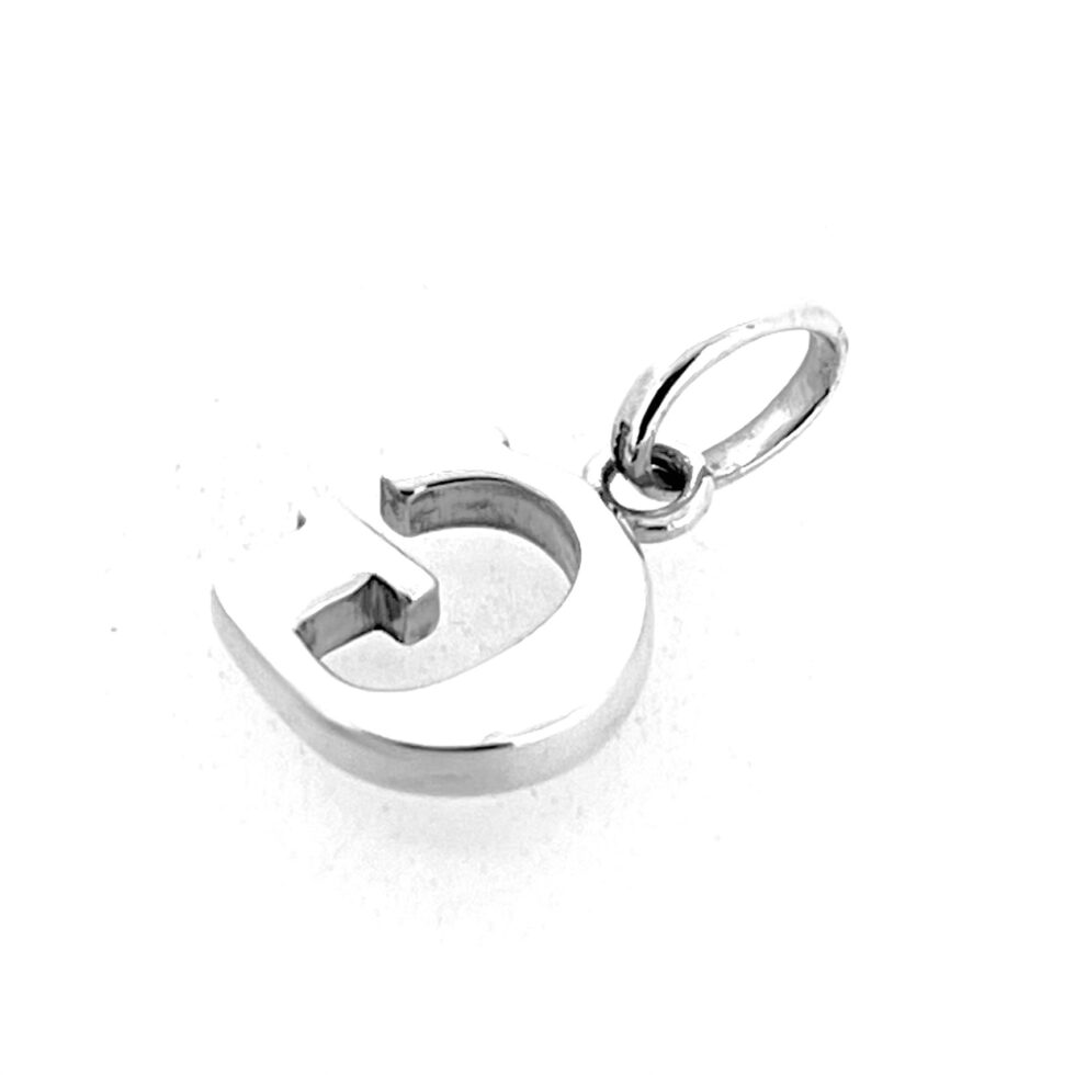 Links of London alphabet G charm displayed against soft neutral background showing shine.