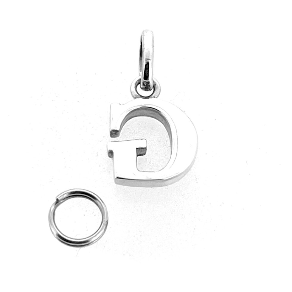 Vintage Links of London Letter G Charm lying flat beside measuring scale for size reference.