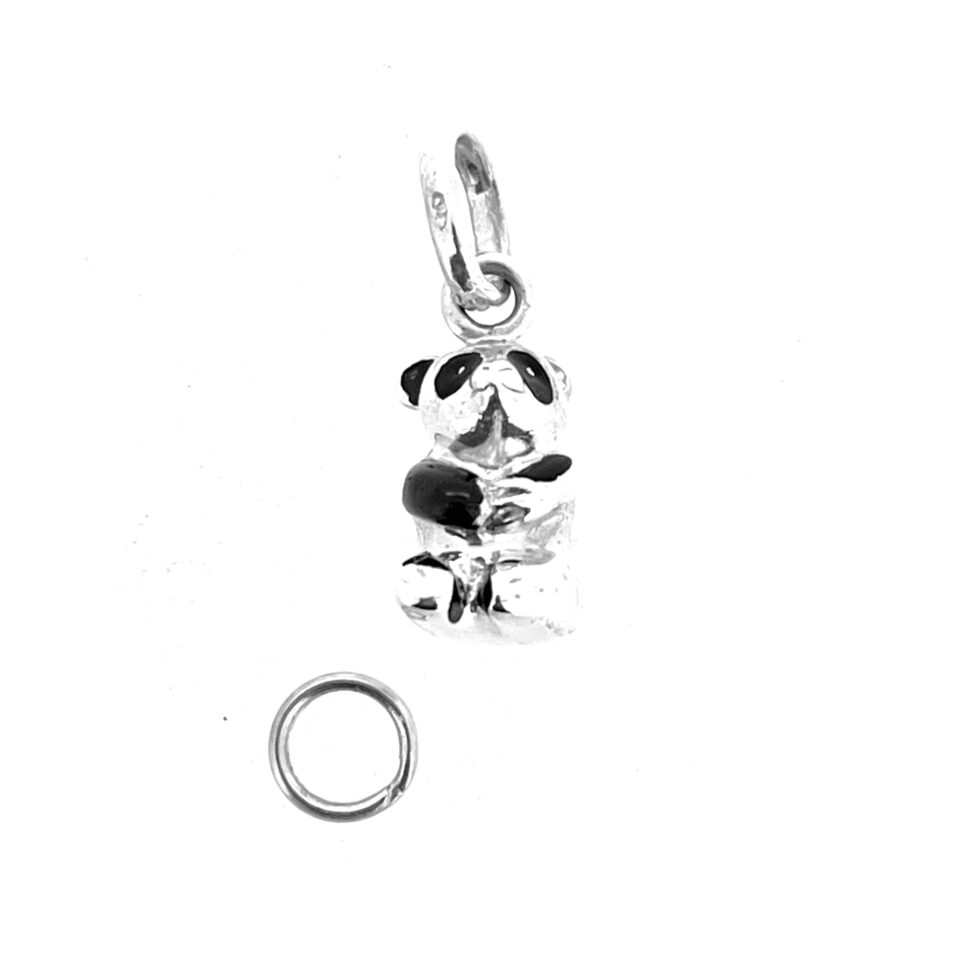 Close-up of black enamel panda charm from Links of London