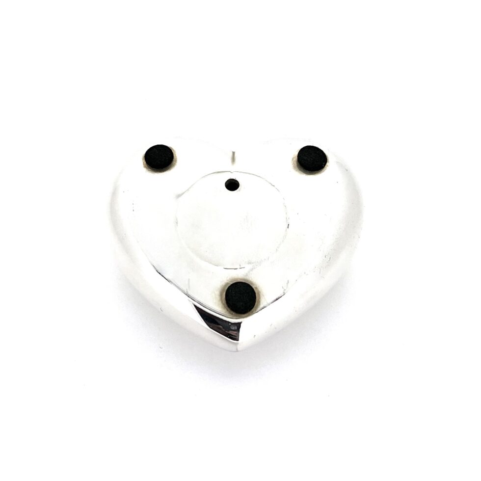 Reverse of heart with three black foam feet