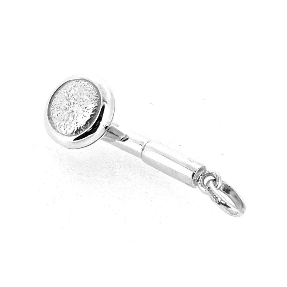 Close-up of earpiece texture and silver finish