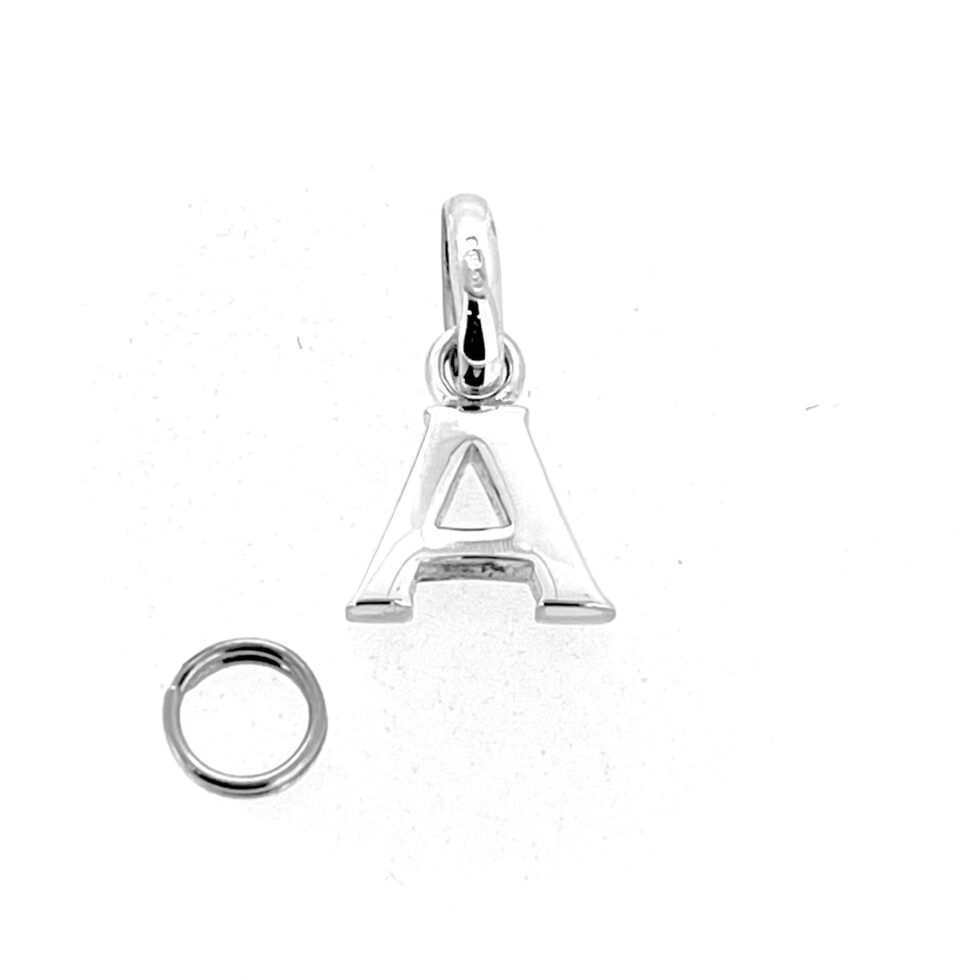 Close-up of serif-style letter A in sterling silver