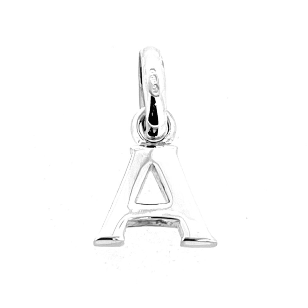 Restored and polished vintage Links charm