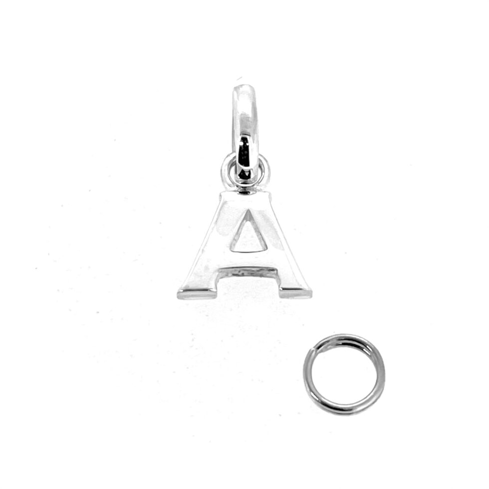 Polished surface reflection of Initial A Charm