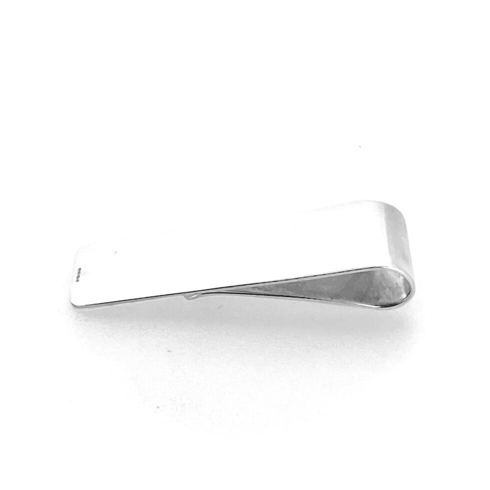 Vintage silver money clip on white background