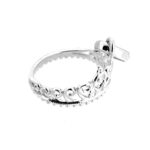 Side angle of polished sterling silver tiara charm with bail.