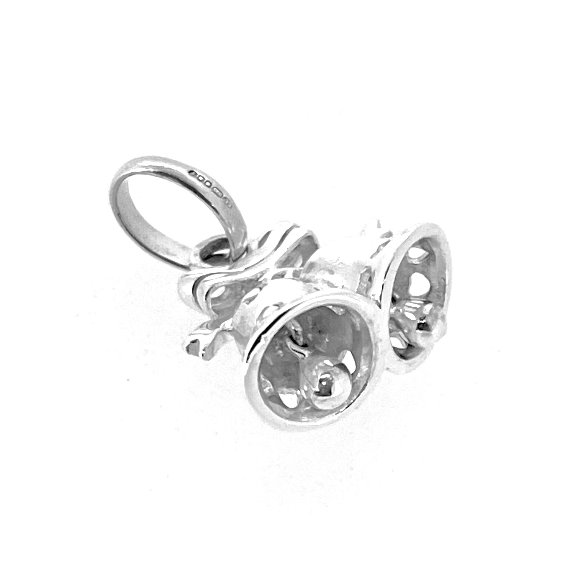 Collectible 2010 wedding bells charm photographed on white