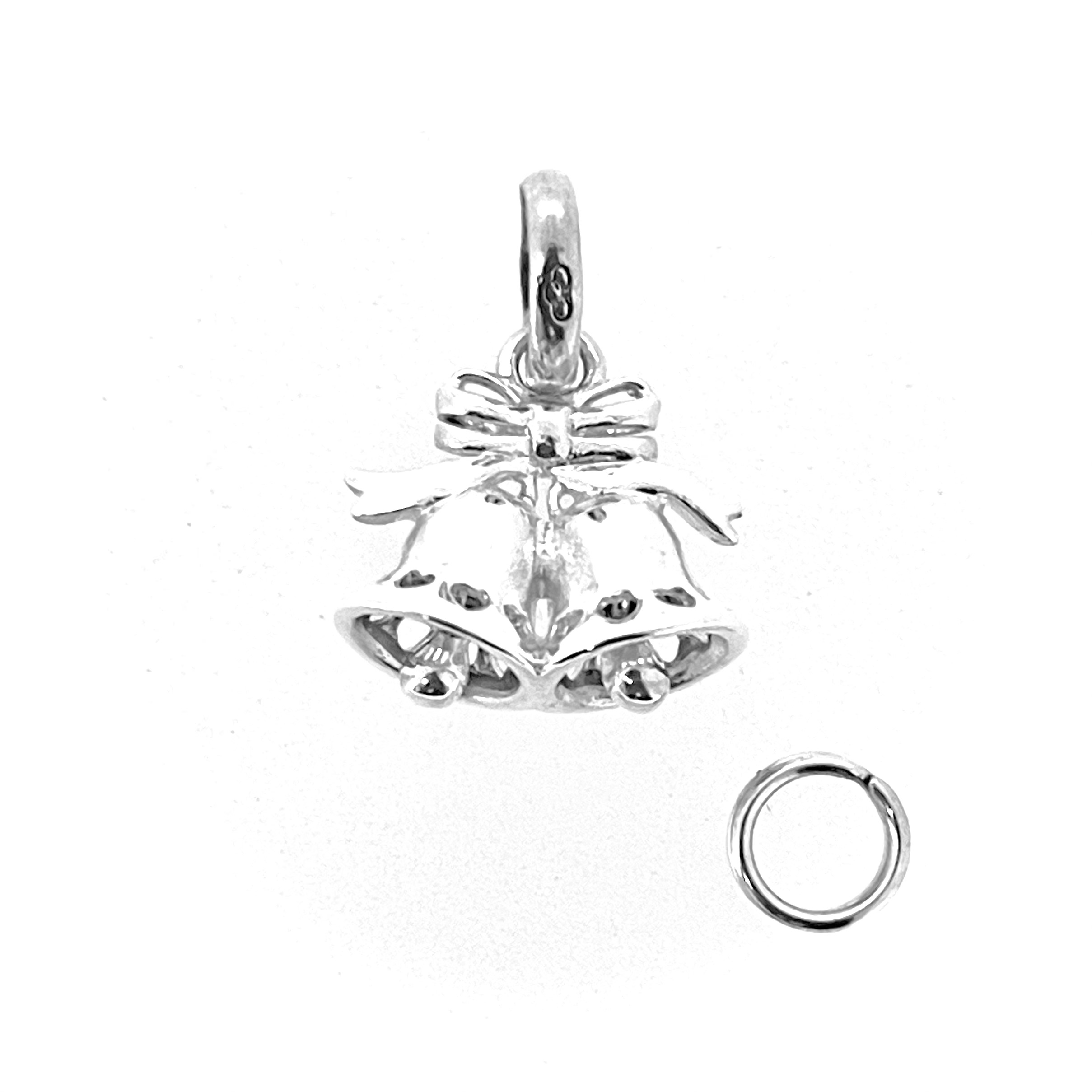 Close-up of silver twin bells charm tied with ribbon