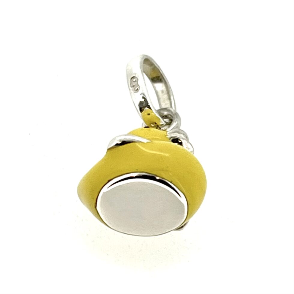 Side view showing enamel gloss and charm proportions