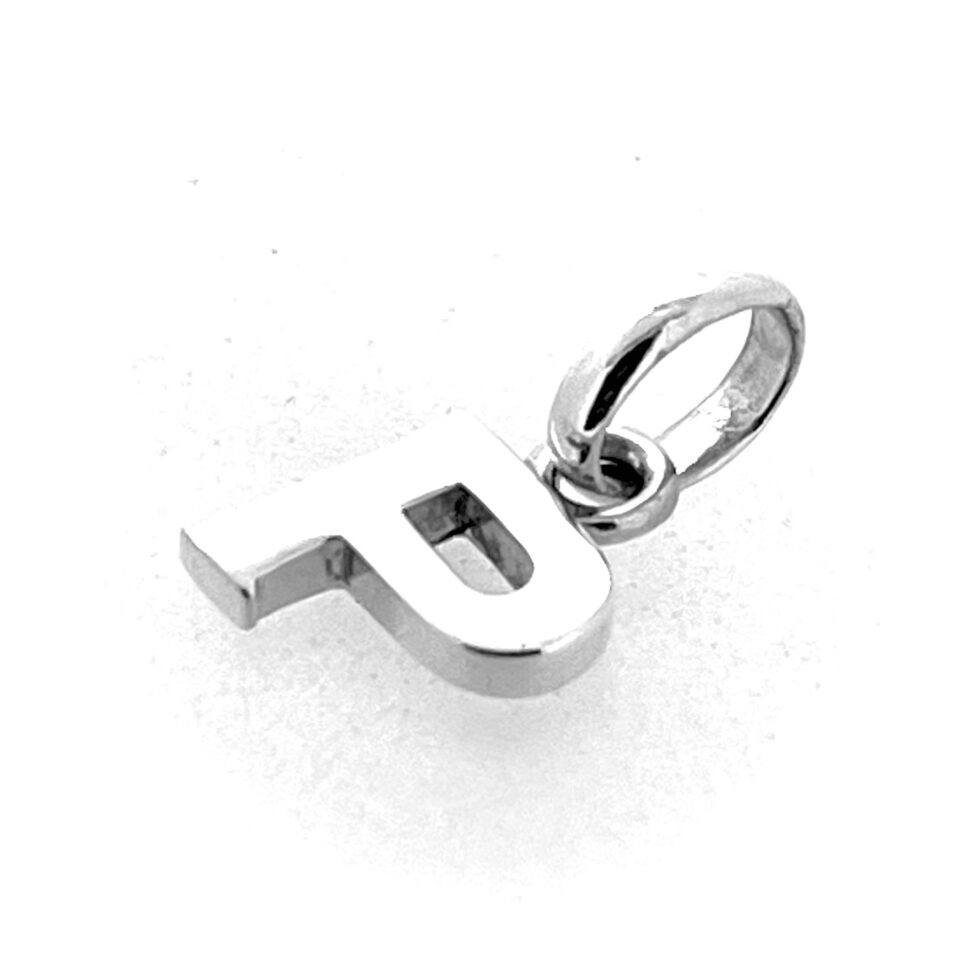 Macro detail of sterling silver surface and letter shape