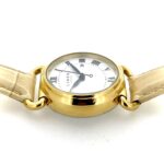 Top-down view showing 31 mm gold-plated case and elegant proportions.