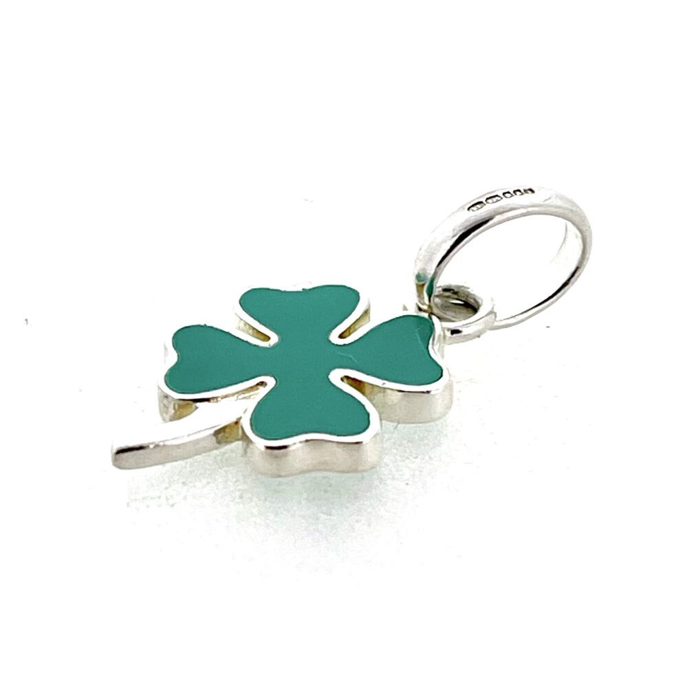 Four leaf clover charm displayed flat ready for photography