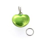 Green enamel heart charm on white background polished finish