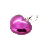 Side angle highlighting silver edges and enamel curvature