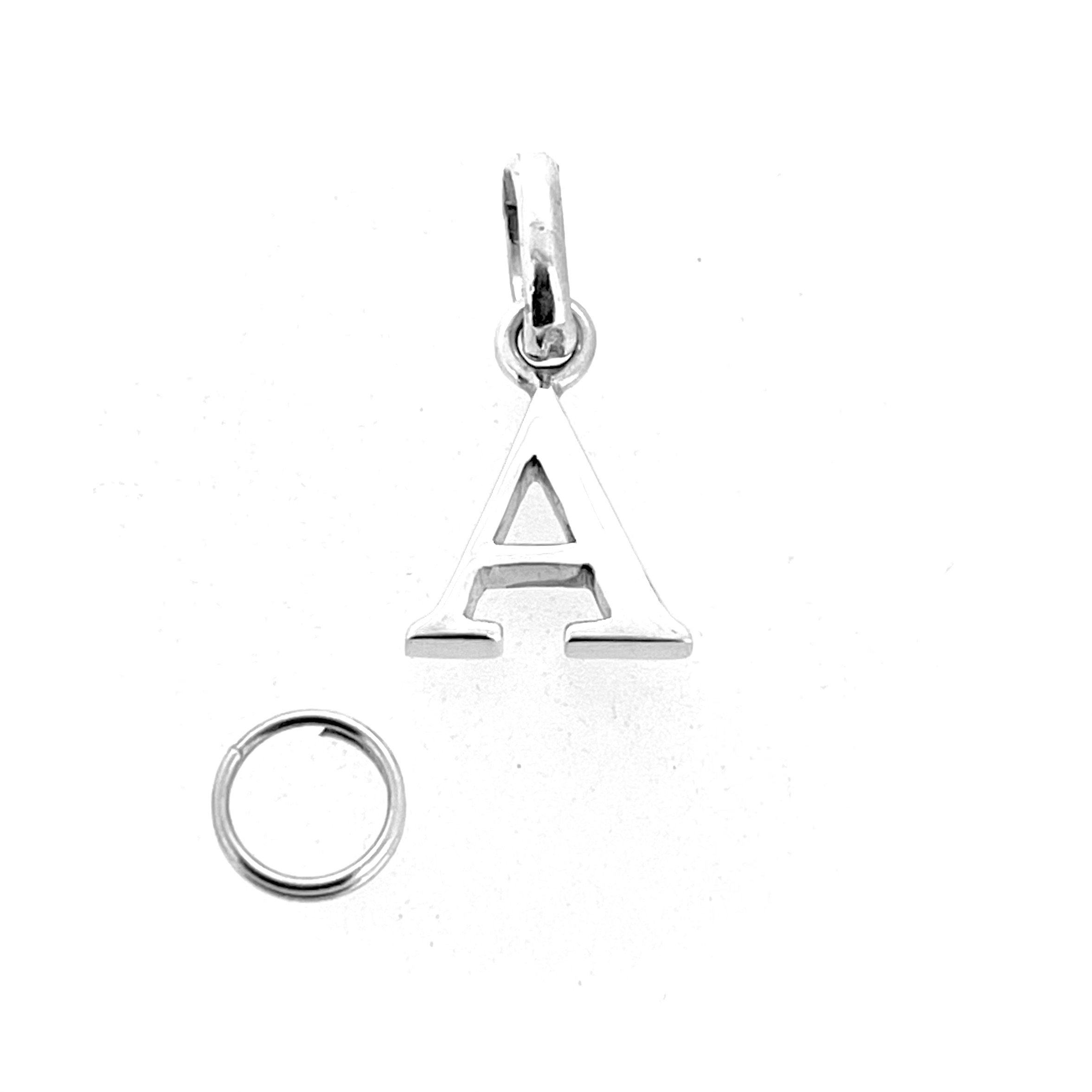 Vintage Links of London serif alphabet charm on white background