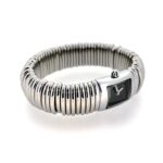 Side profile showing curved rectangular case and Sweetie bracelet.