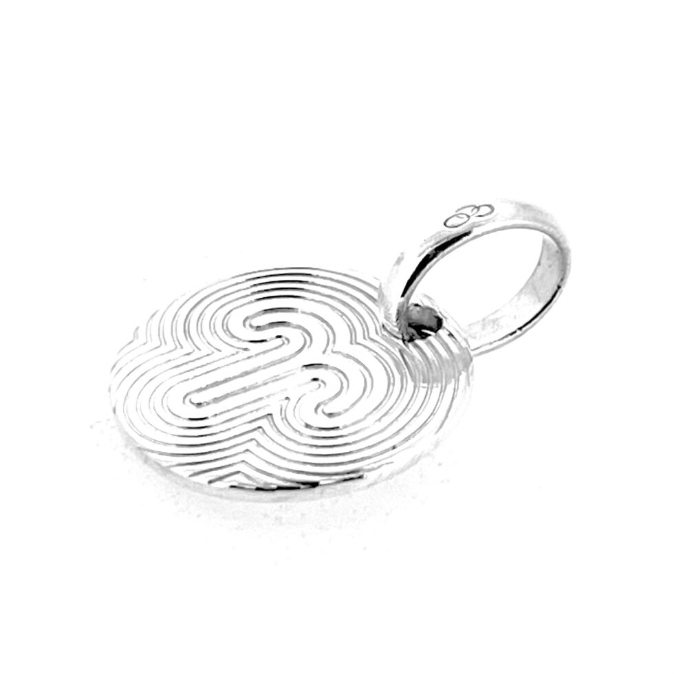 Vintage Aries charm professionally cleaned and polished