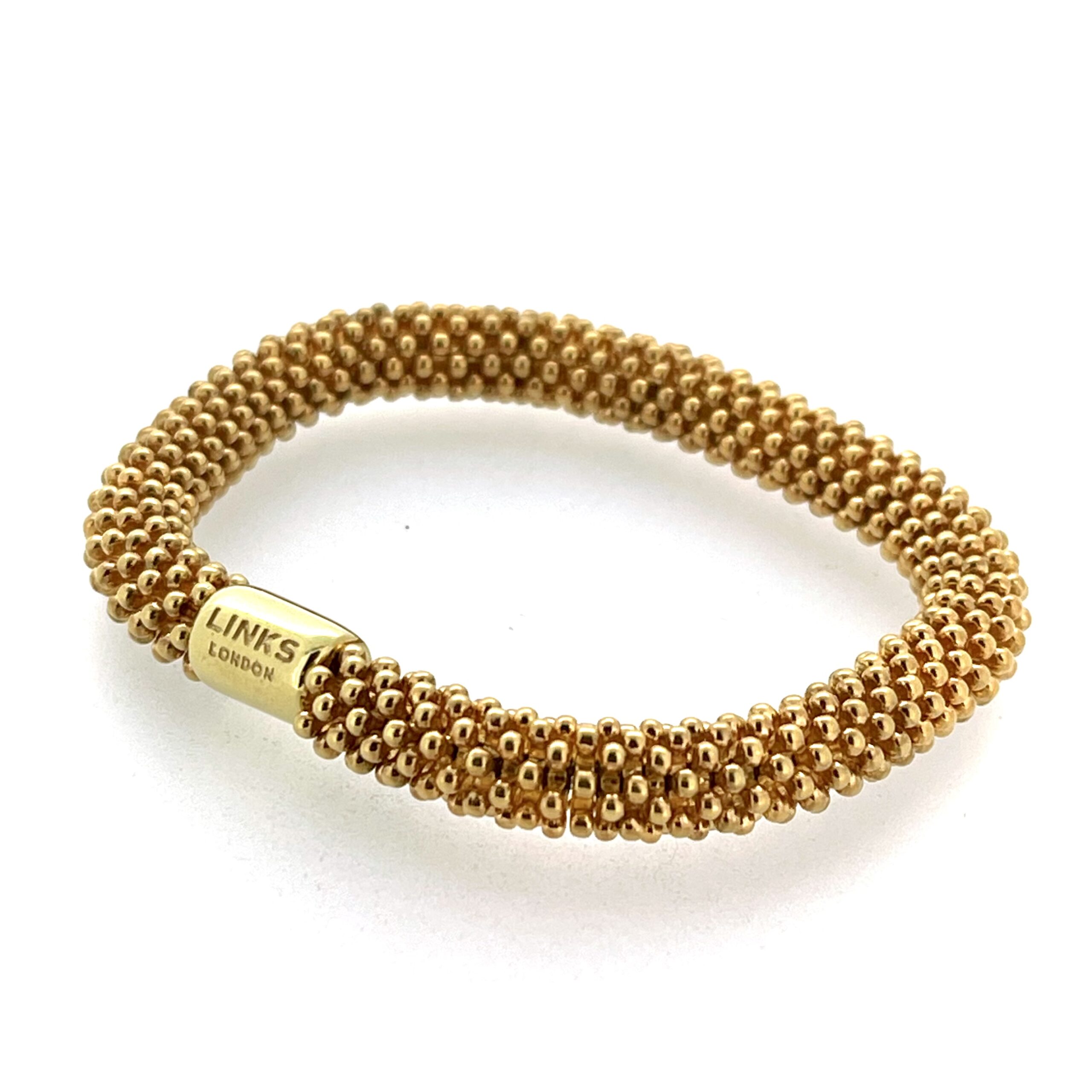 Refurbished vintage bracelet photographed flat on white background