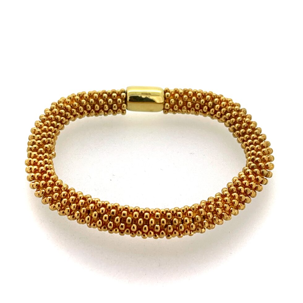 Refurbished bracelet showing polished vermeil surface