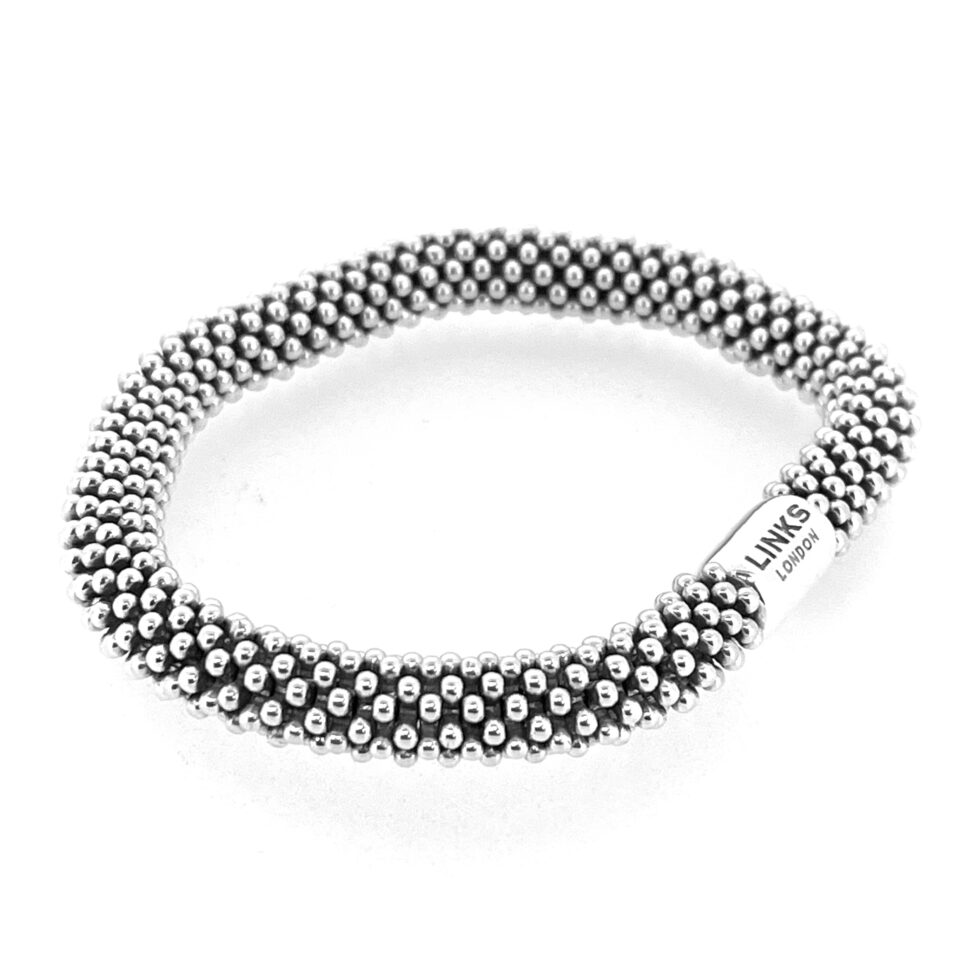 Sterling silver star bead bracelet close-up.