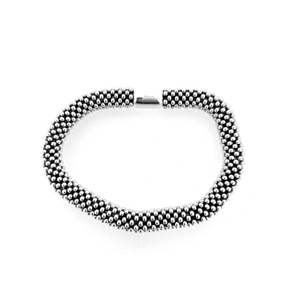 Polished sterling silver stars close-up.