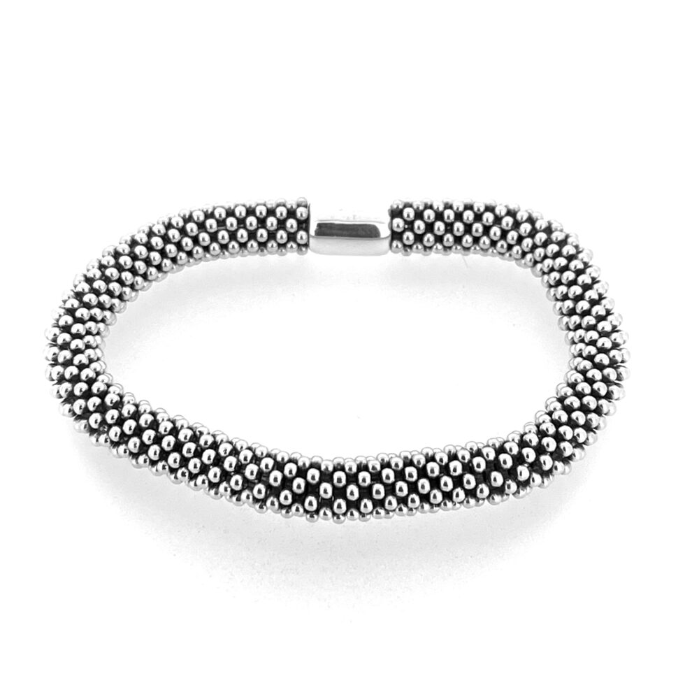 Restored star beads in bright silver.