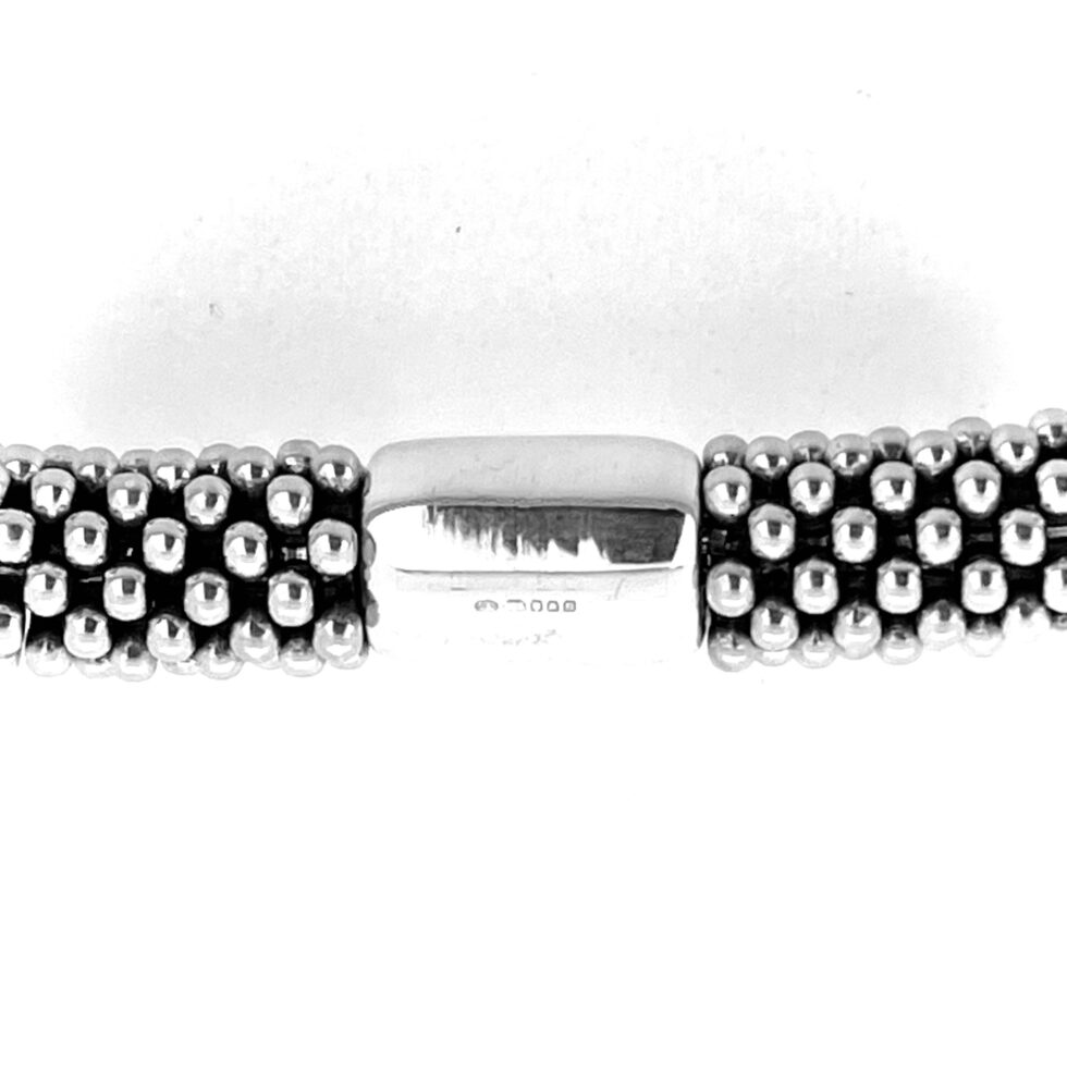 2012 hallmark on silver bracelet.