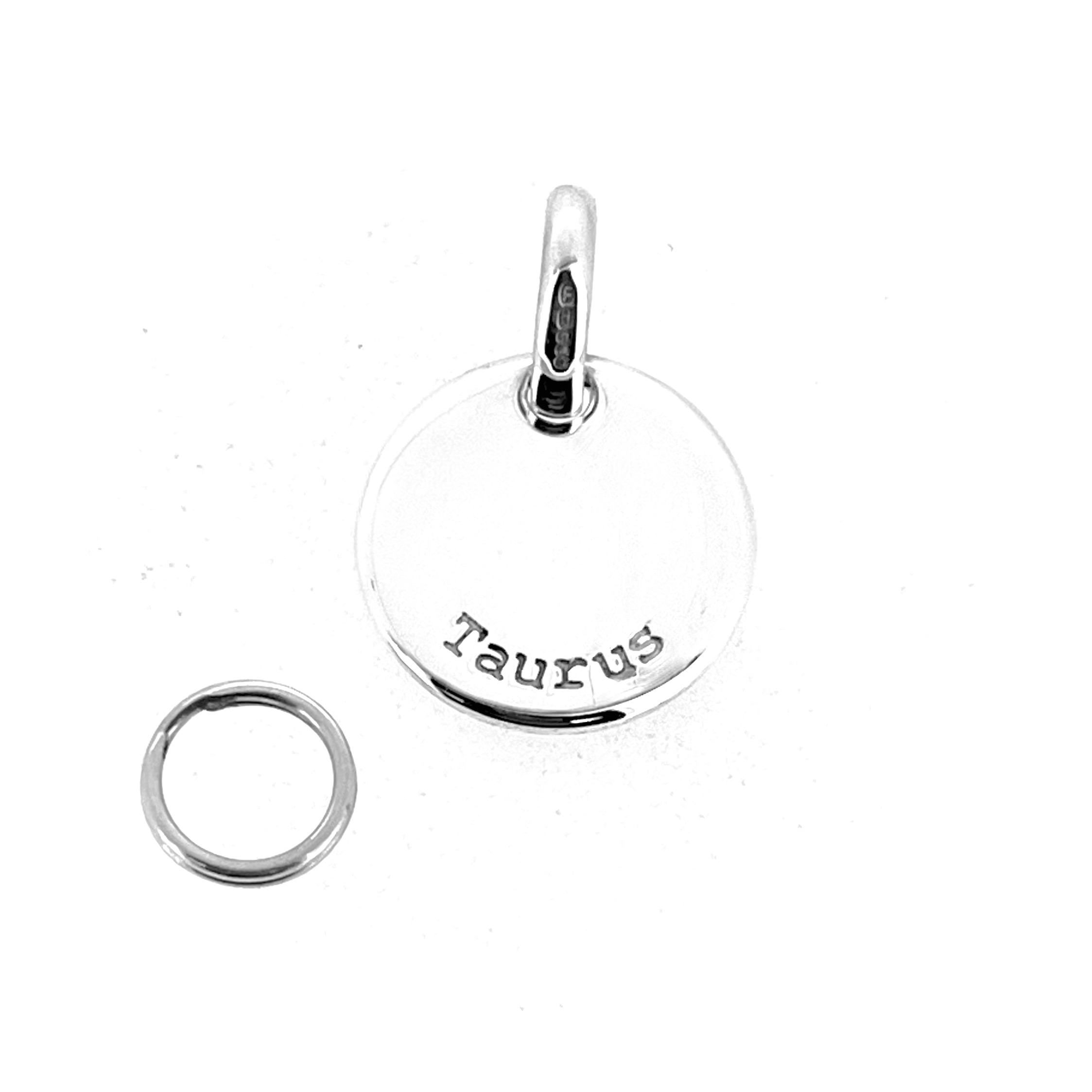 Silver Taurus charm shown with split ring.