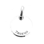 Reverse side of Taurus charm engraved with “Taurus.”